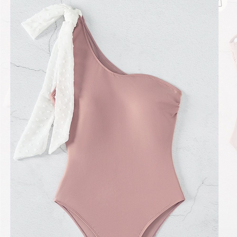 CUPSHE Pink one piece with White Textured Bow that is adjustable